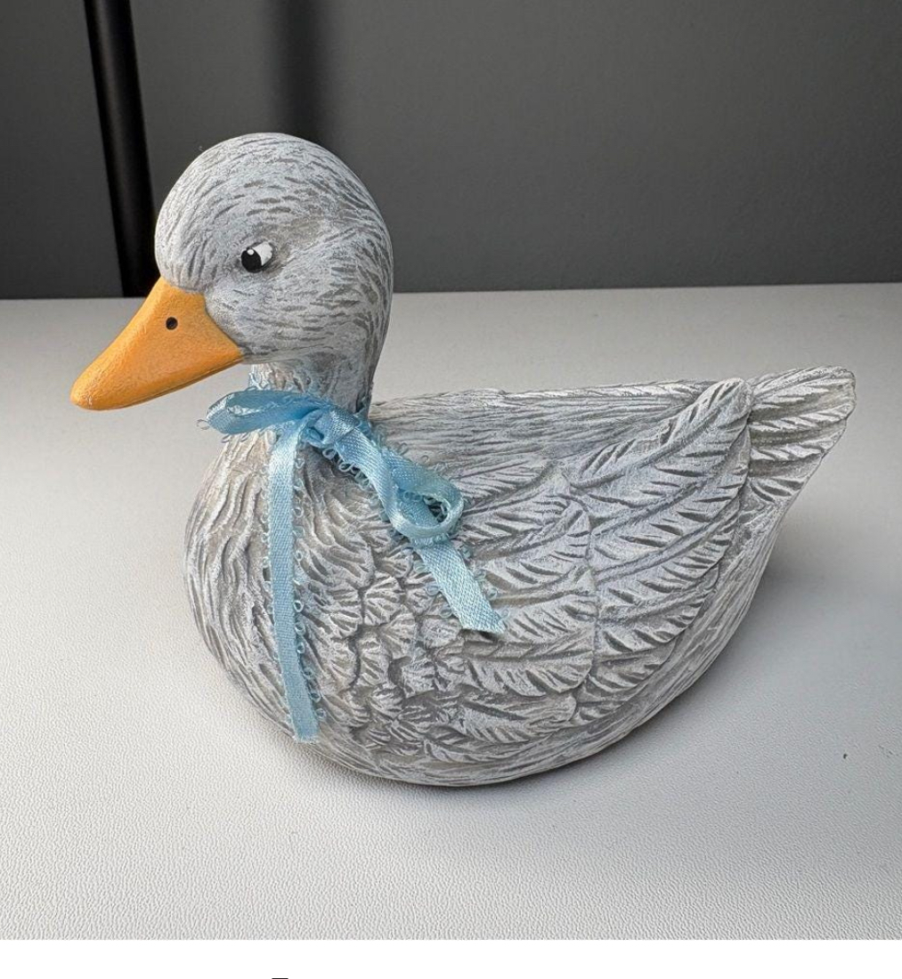 Ceramic Duck Figurine with Blue Ribbon