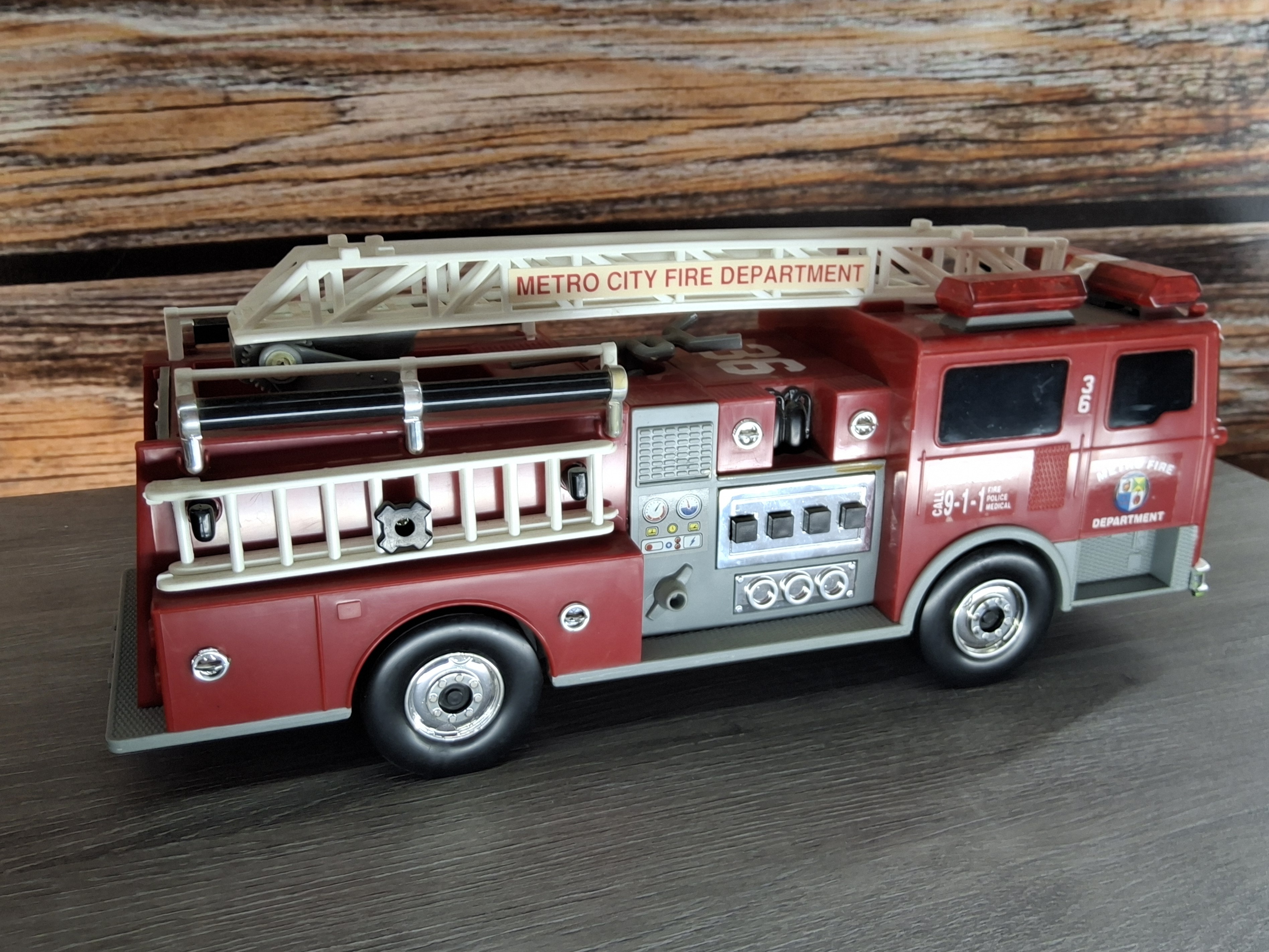 Large Plastic Metro City Fire Department Ladder Truck No. 36 Toy