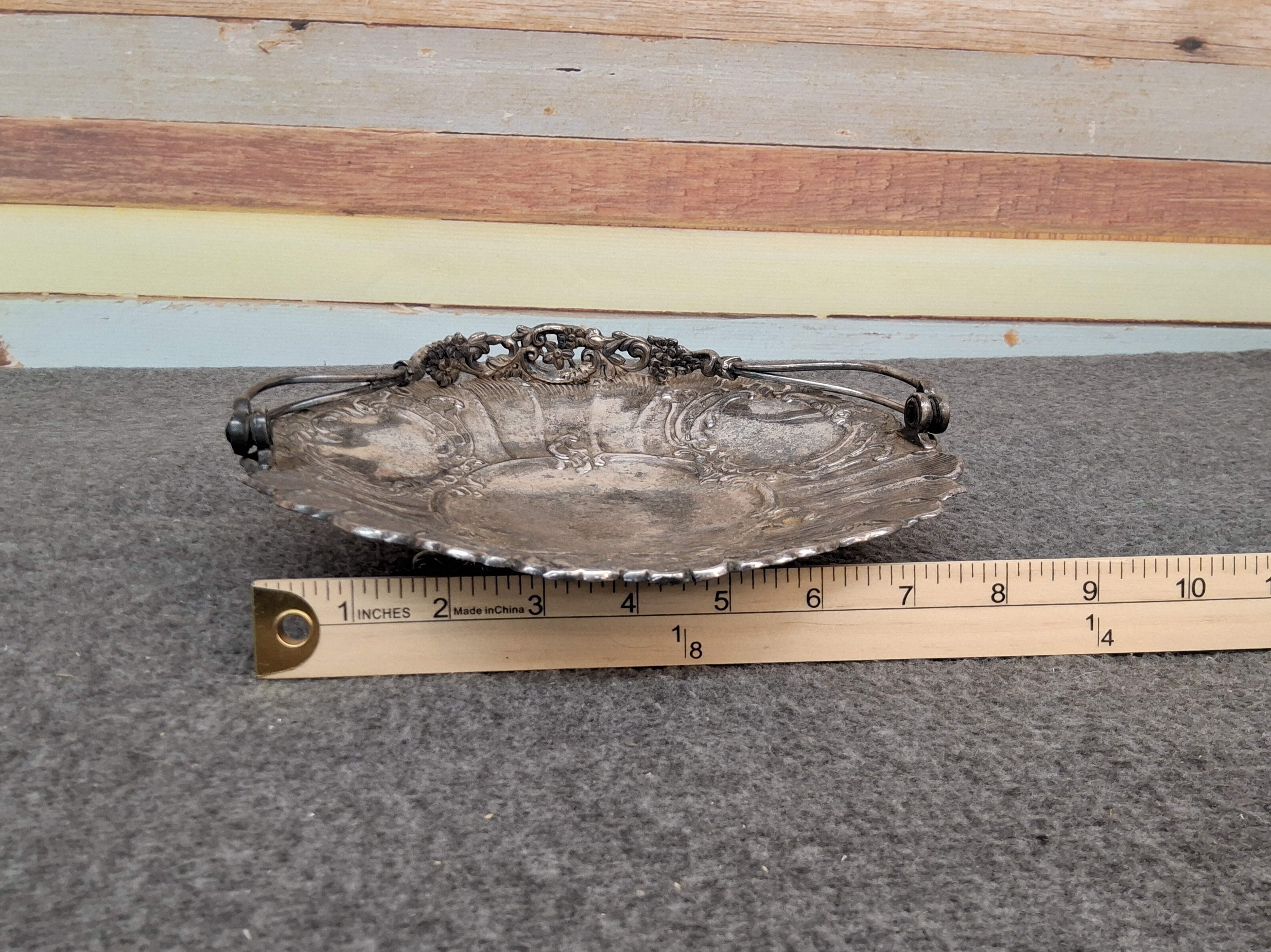 Antique silver-plated fruit basket with a handle