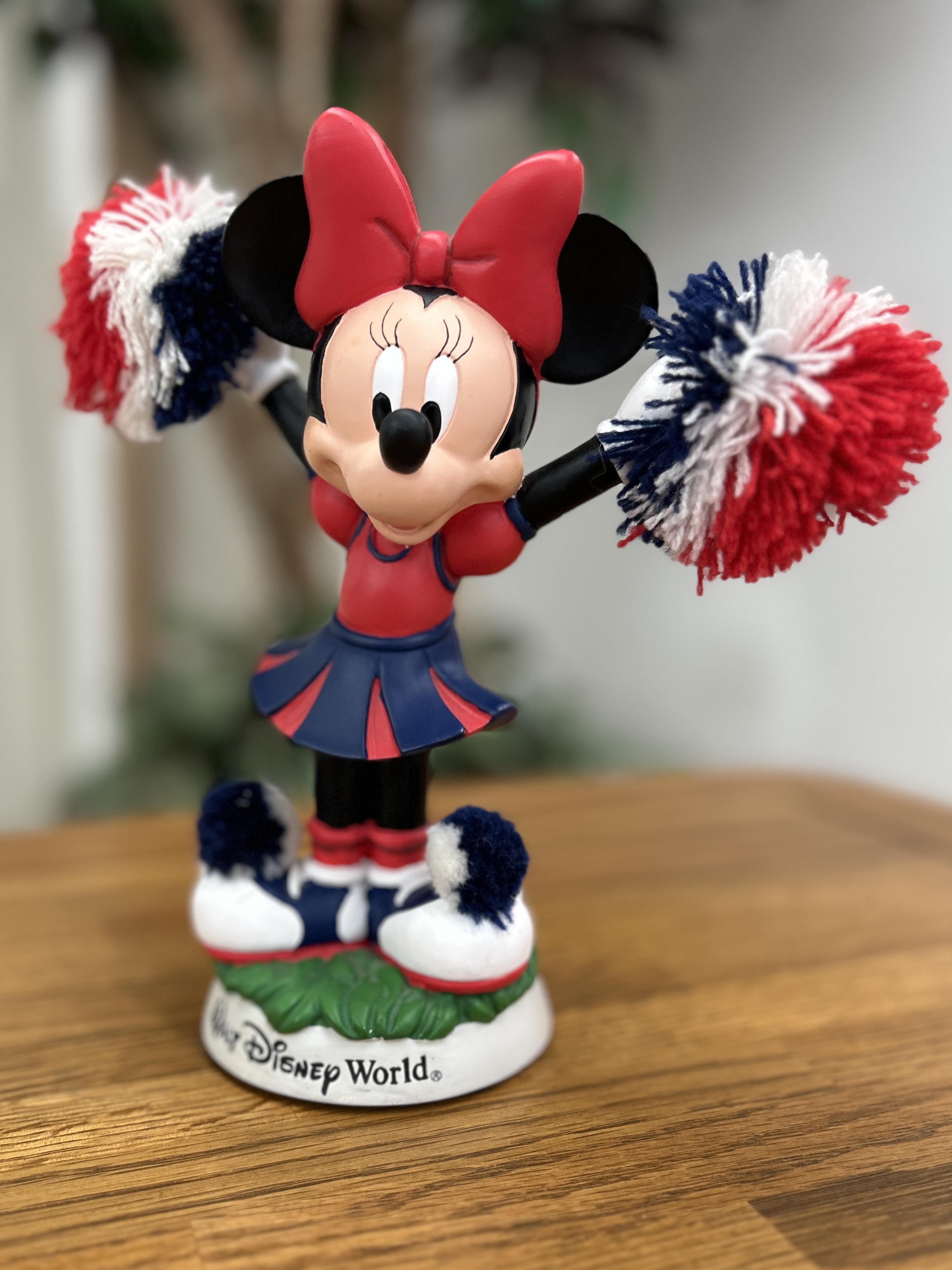 Walt Disney Minnie mouse cheer leader with pom poms, bobble head