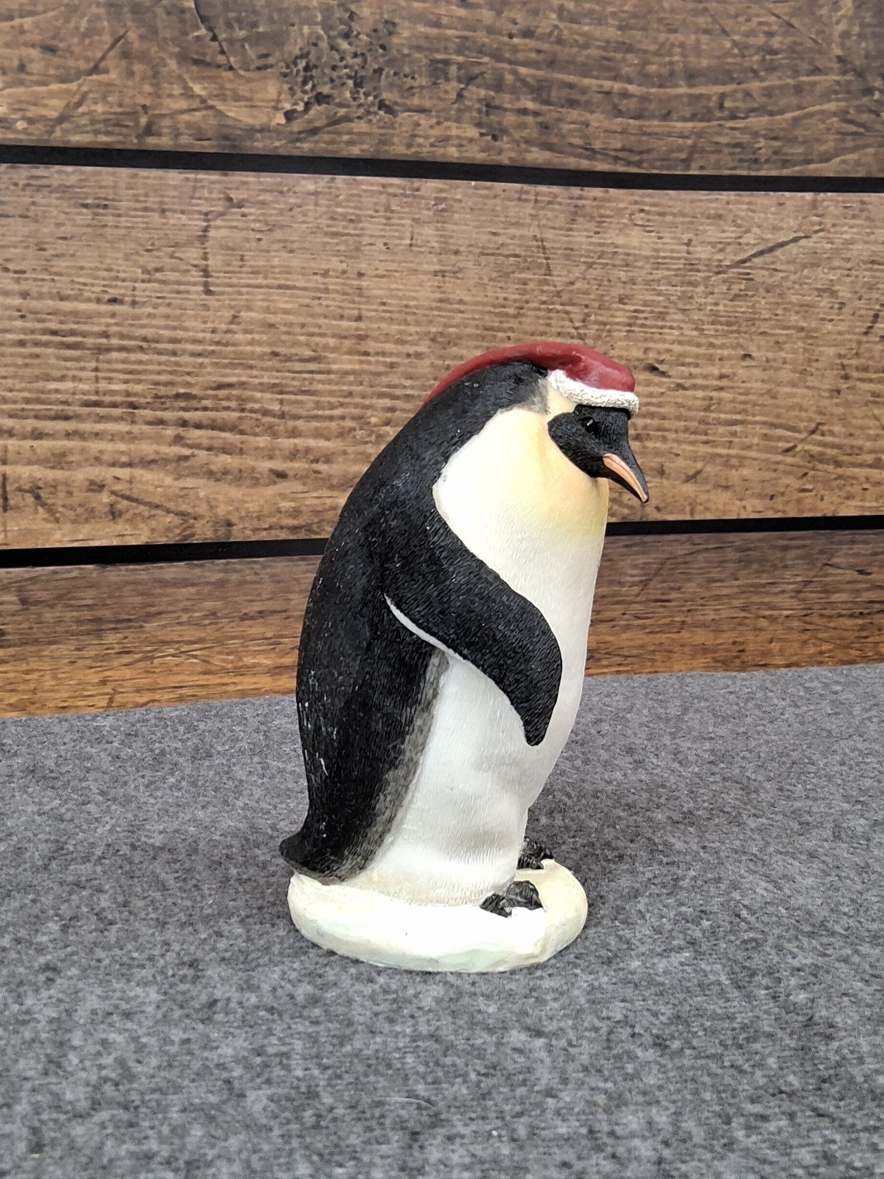 Penguin Figurine with Red Hat